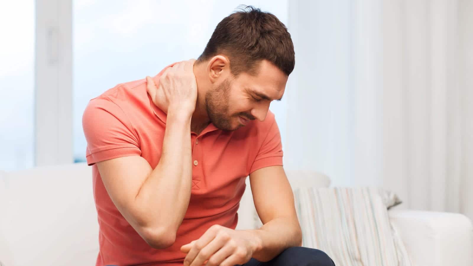 Neck Pain Stock Photo