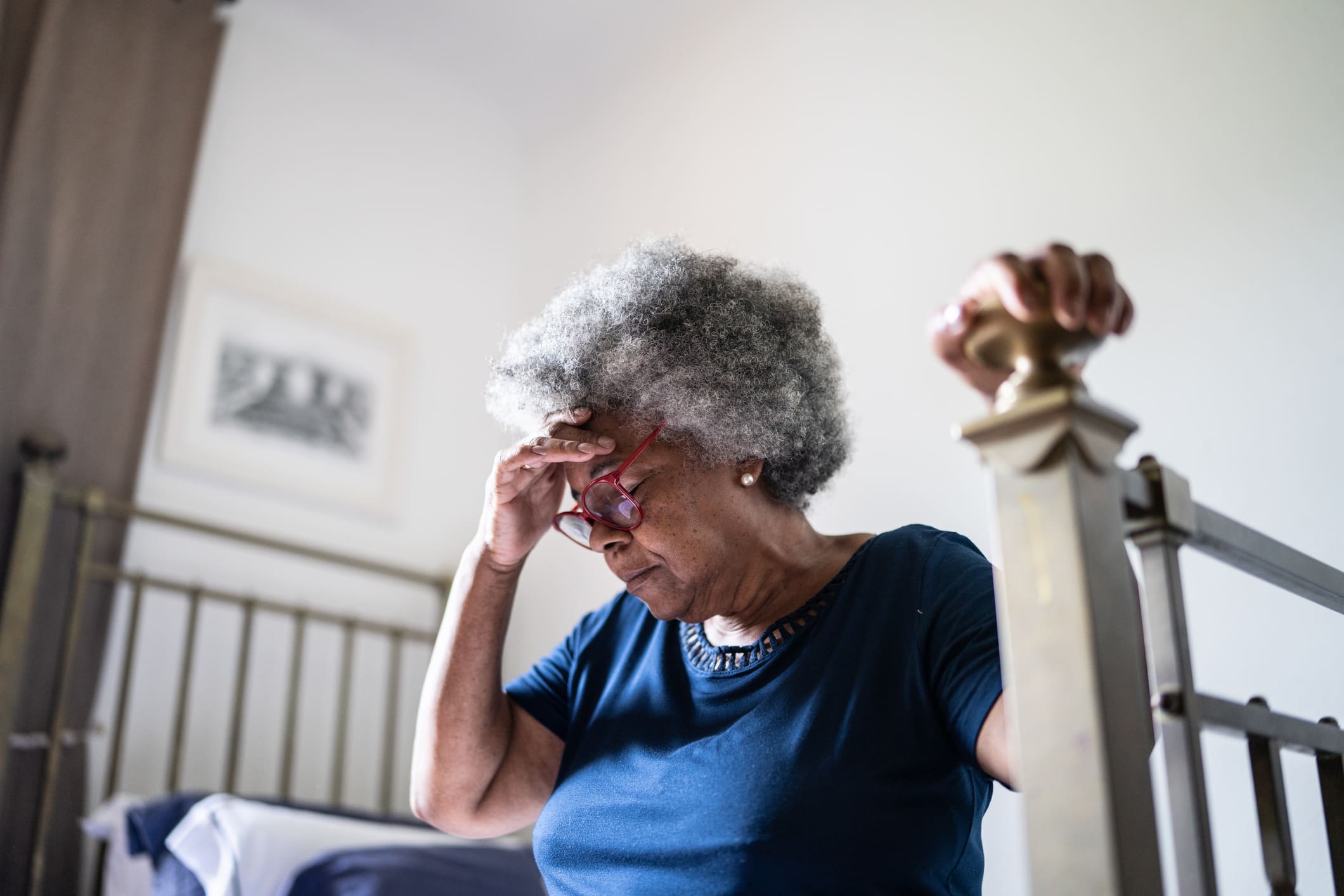 An elderly lady dealing with the stress of being financially abused.