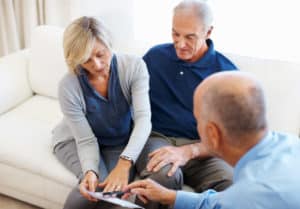 older couple meeting with their Long-Term Care Ombudsman