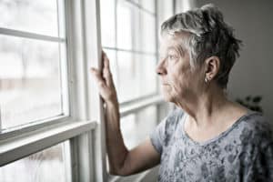 A lonely elderly woman suffering neglect in her Charleston, WV, nursing home.