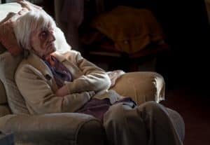 A elderly woman after suffering elder neglect.